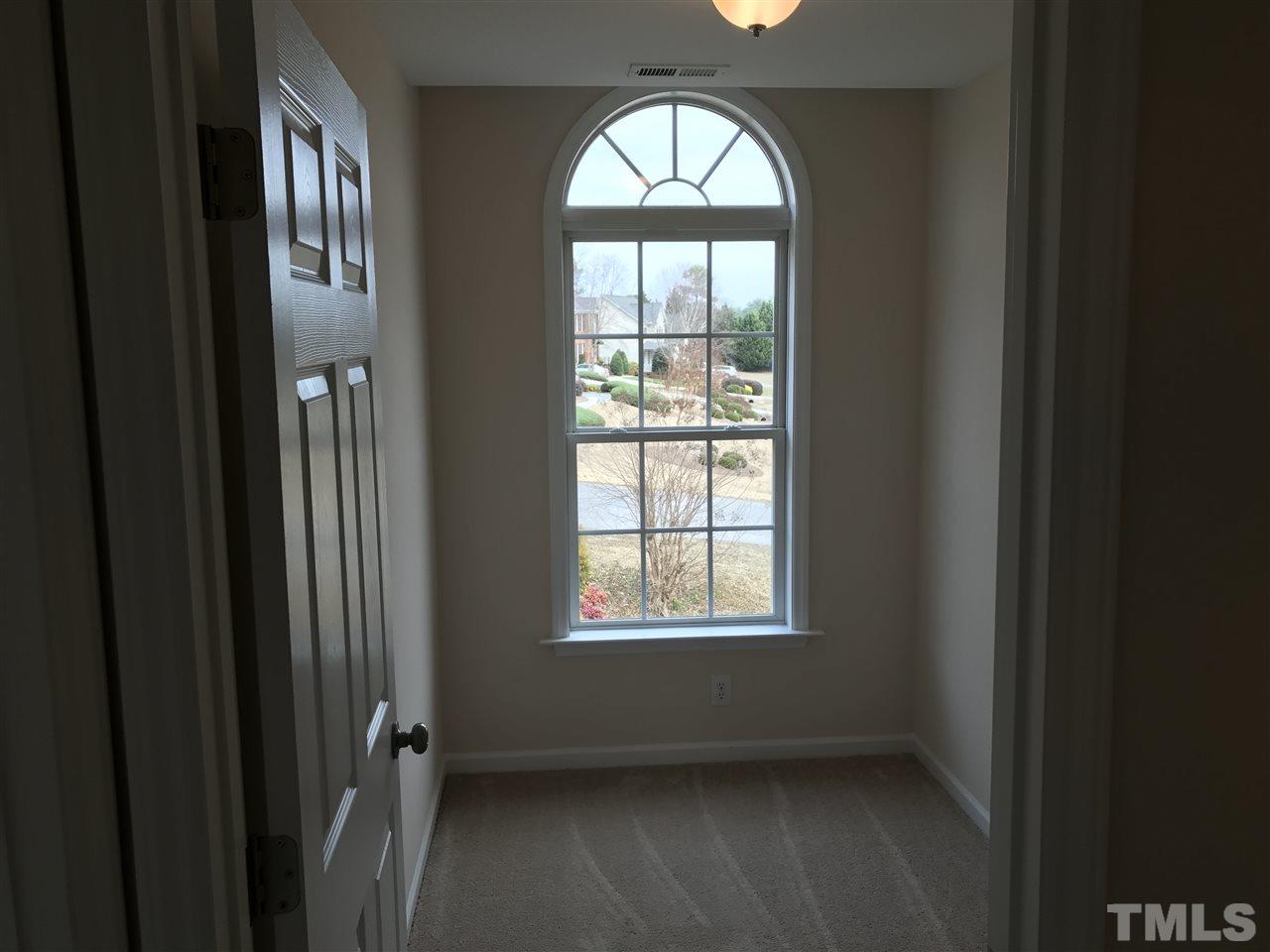 3220 La Costa Way Raleigh, NC 27610 - Photo 14 of 16 a view of empty room with windows