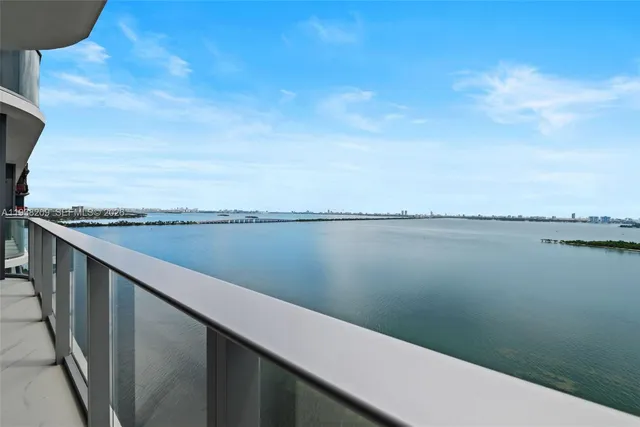 a view of a lake from a balcony