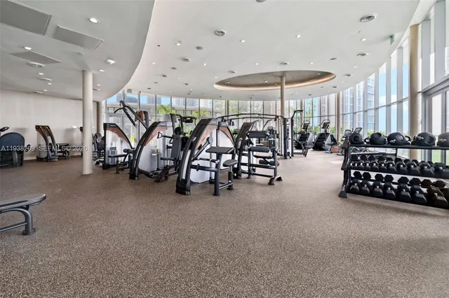 a very nice looking room with gym equipment