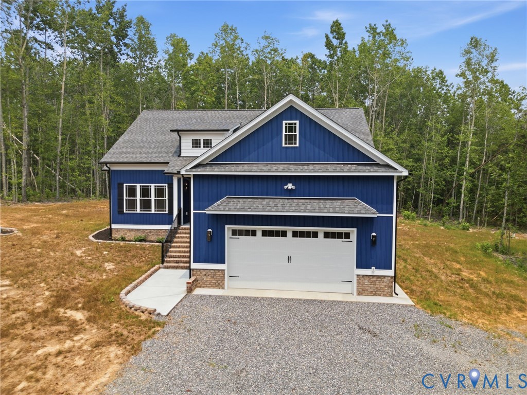 239 Bumpass Road Bumpass, VA 23024 - Photo 9 of 44 Modern home with striking blue vertical siding and