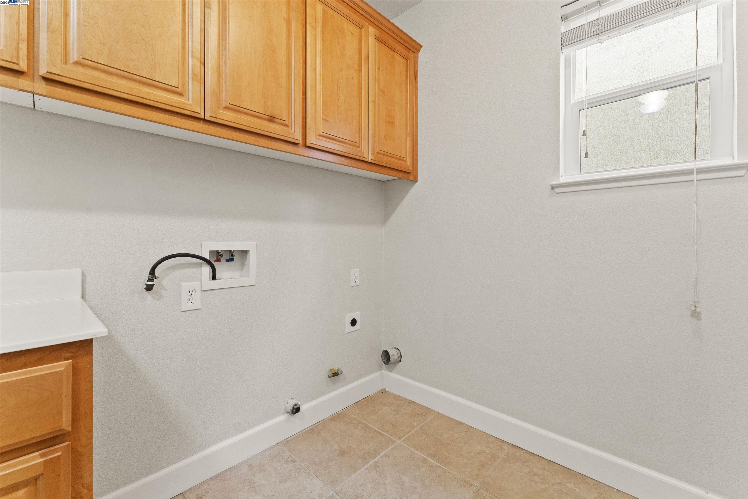 204 Daylilly Lane Patterson, CA 95363 - Photo 24 of 52 a view of storage and utility