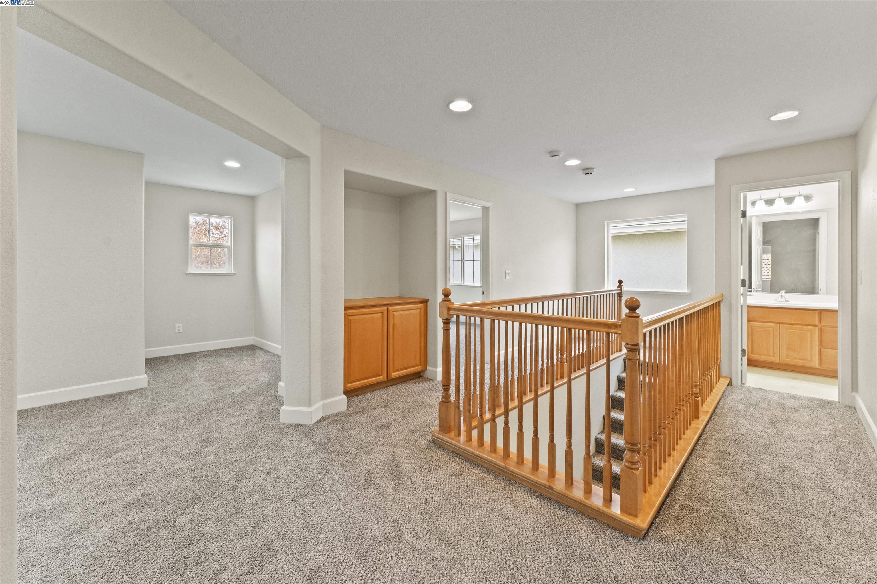 204 Daylilly Lane Patterson, CA 95363 - Photo 25 of 52 a view of a hallway with closet area