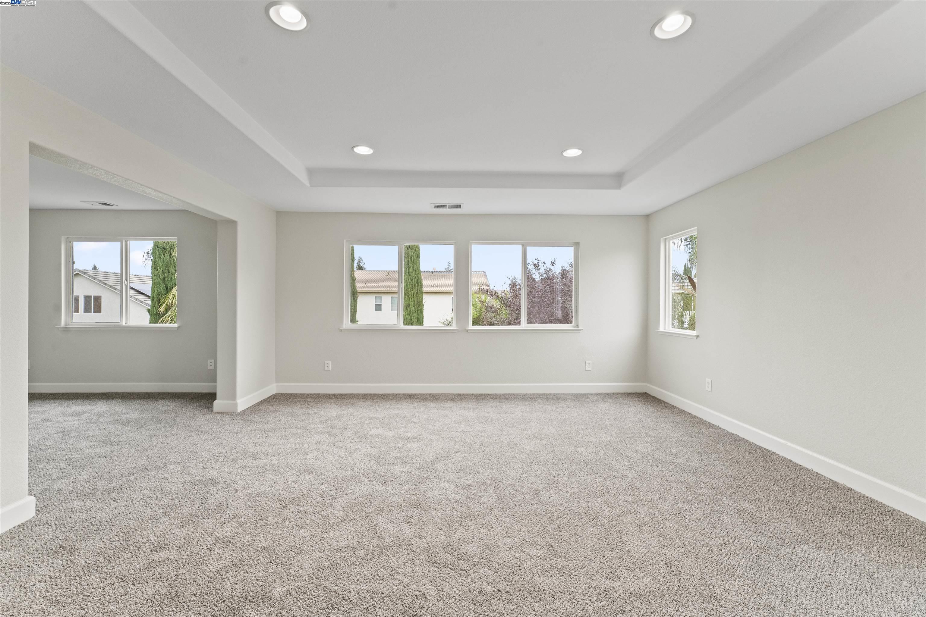 204 Daylilly Lane Patterson, CA 95363 - Photo 31 of 52 a view of an empty room with a window