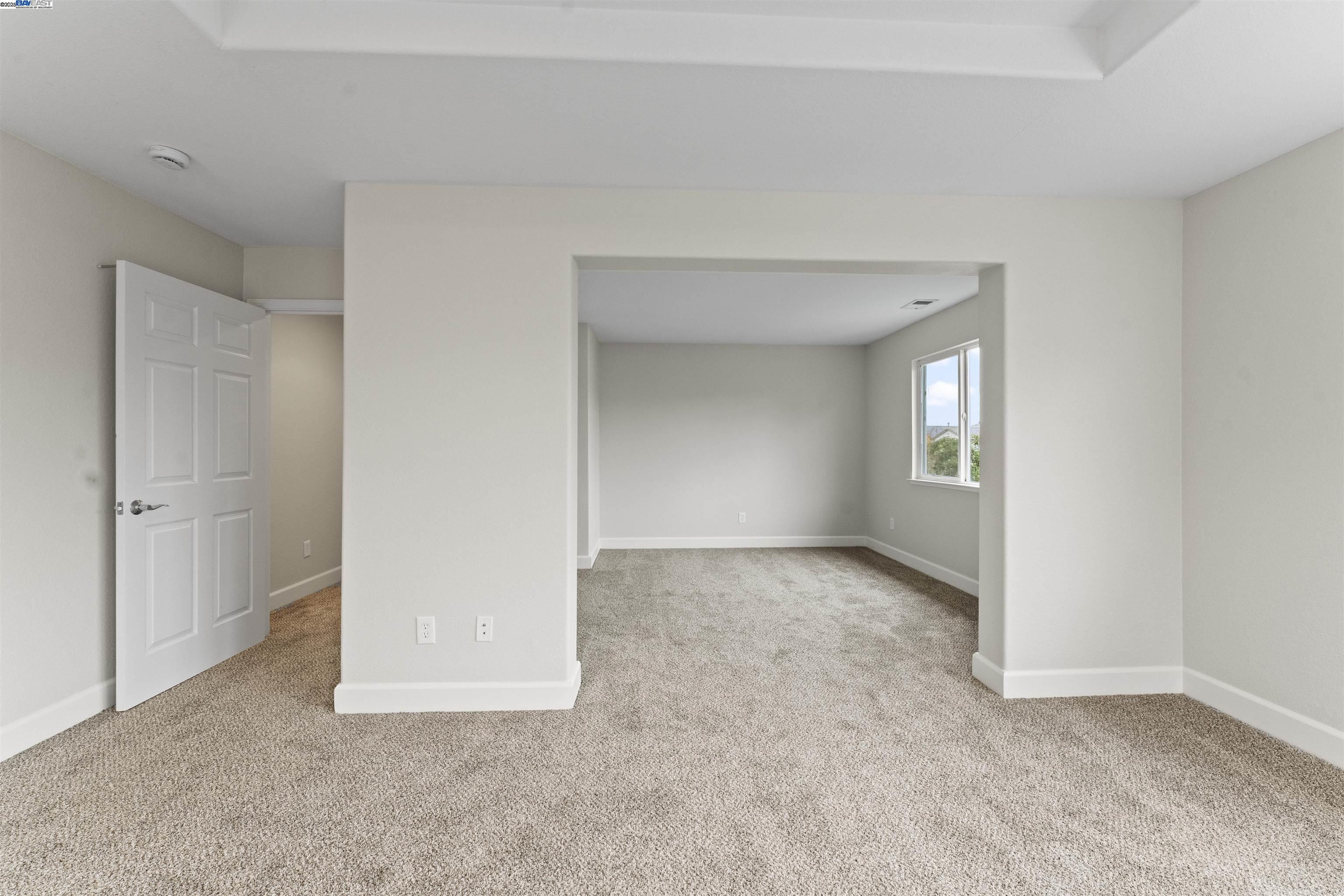 204 Daylilly Lane Patterson, CA 95363 - Photo 33 of 52 a view of an empty room with a window