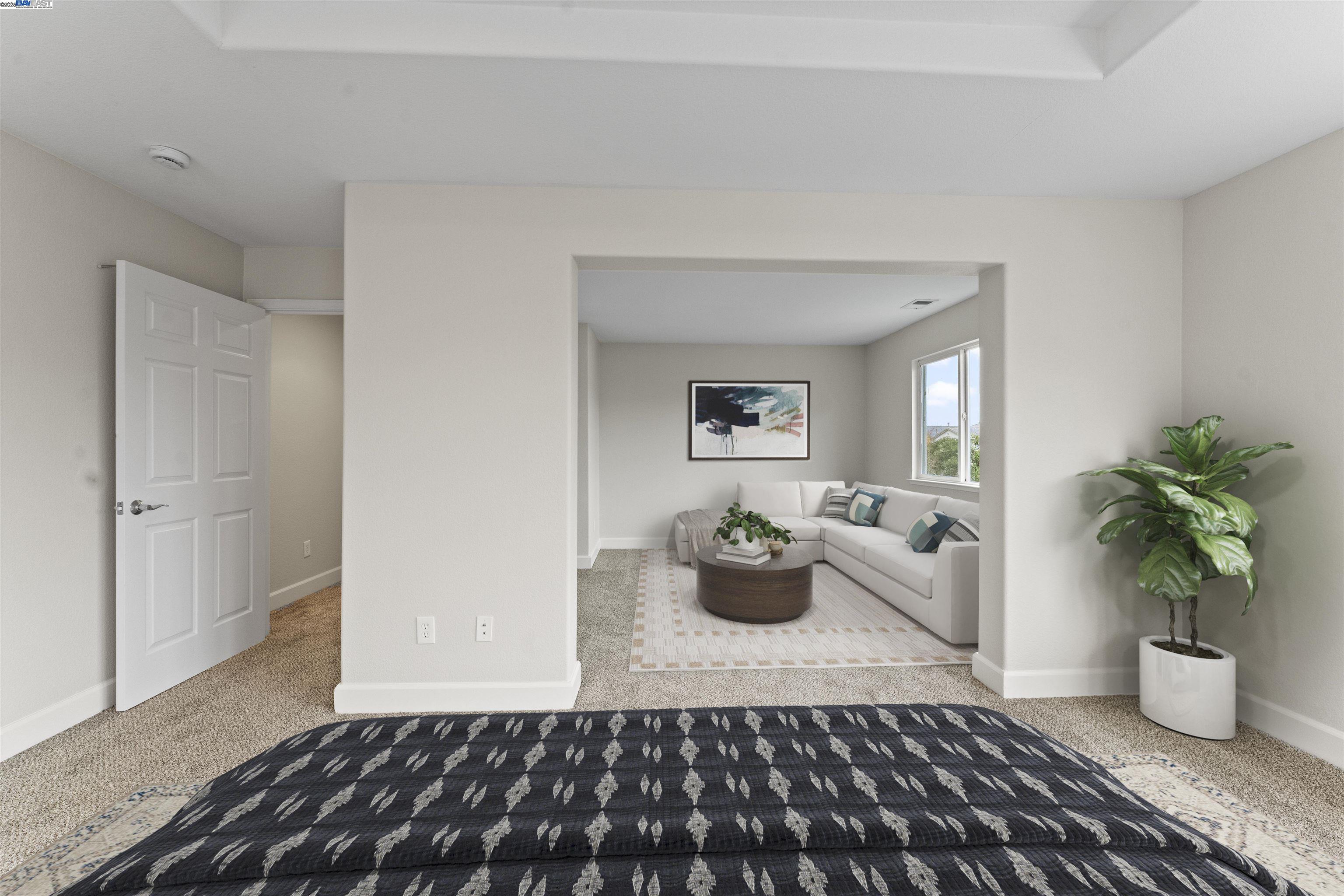 204 Daylilly Lane Patterson, CA 95363 - Photo 34 of 52 a living room with furniture and potted plant