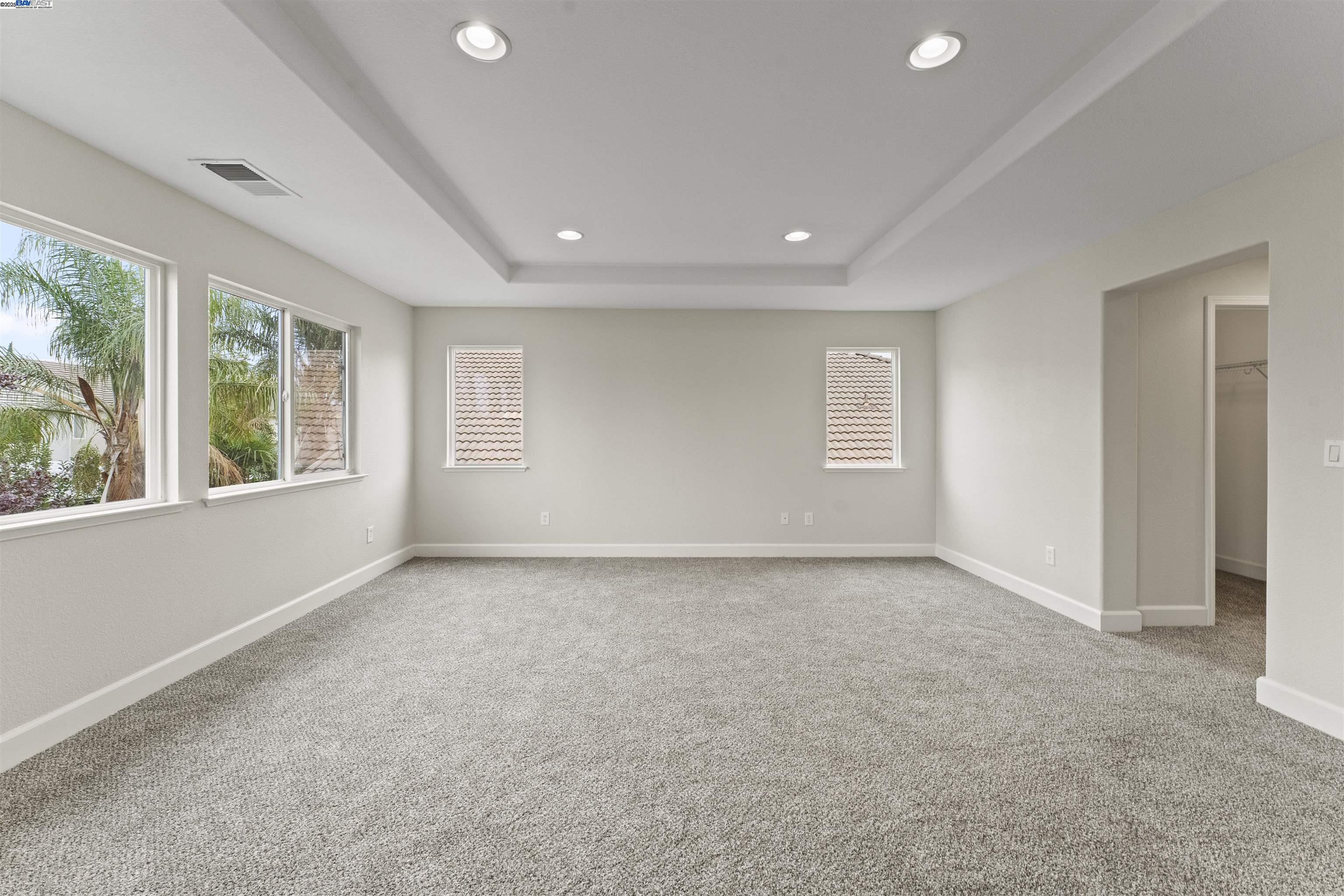 204 Daylilly Lane Patterson, CA 95363 - Photo 35 of 52 an empty room with windows