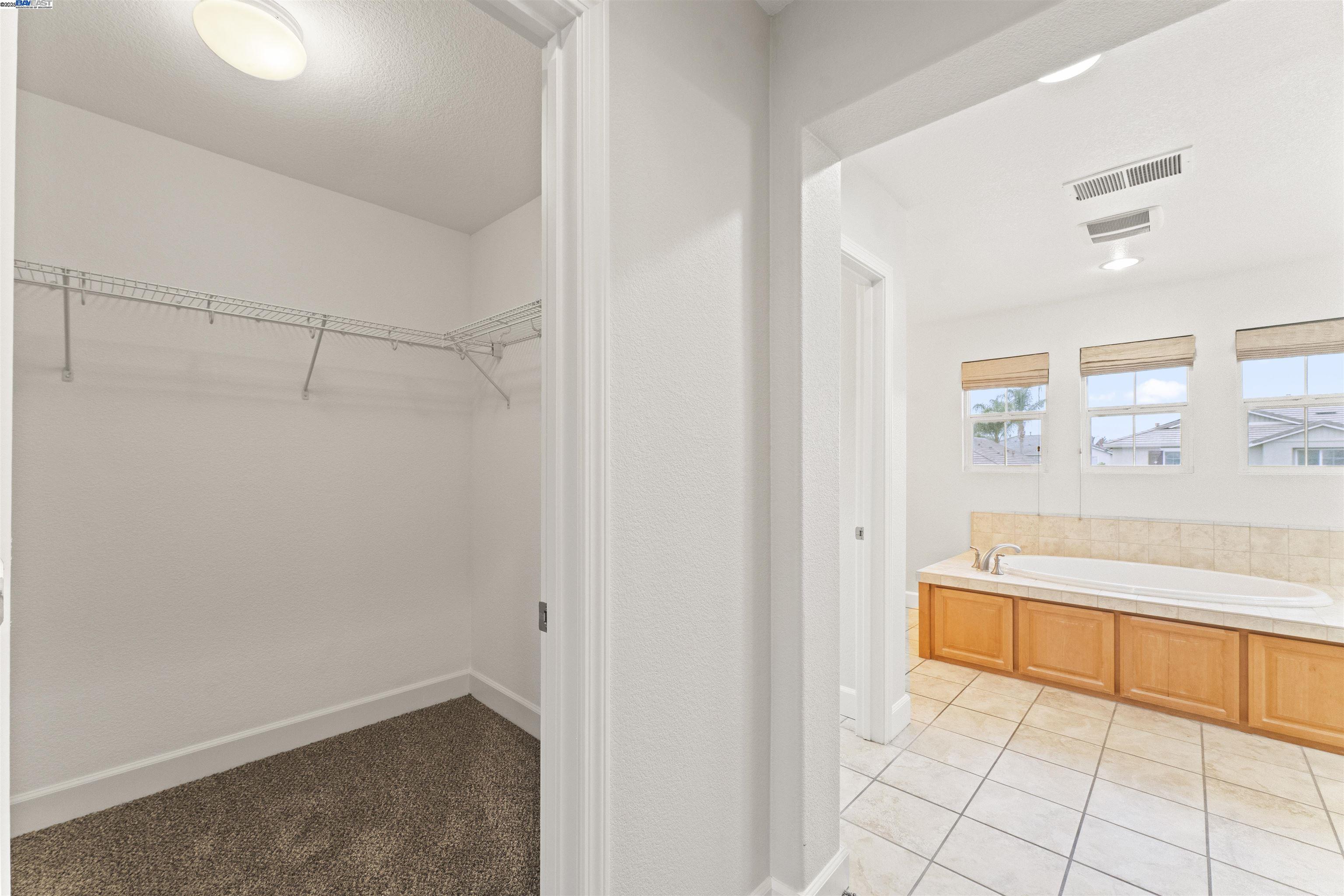 204 Daylilly Lane Patterson, CA 95363 - Photo 42 of 52 a view of an empty room with a window