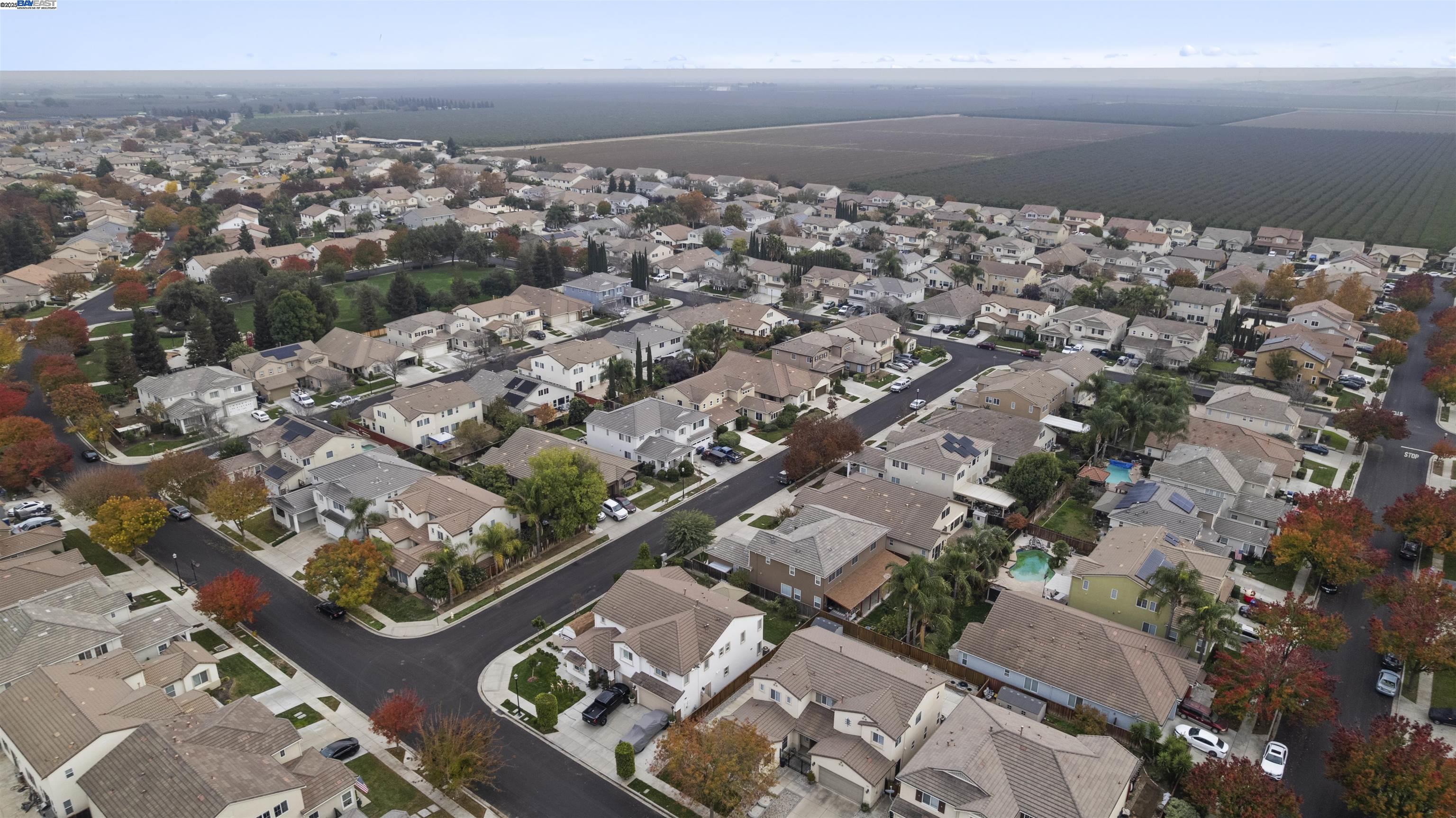 204 Daylilly Lane Patterson, CA 95363 - Photo 50 of 52 an aerial view of a city