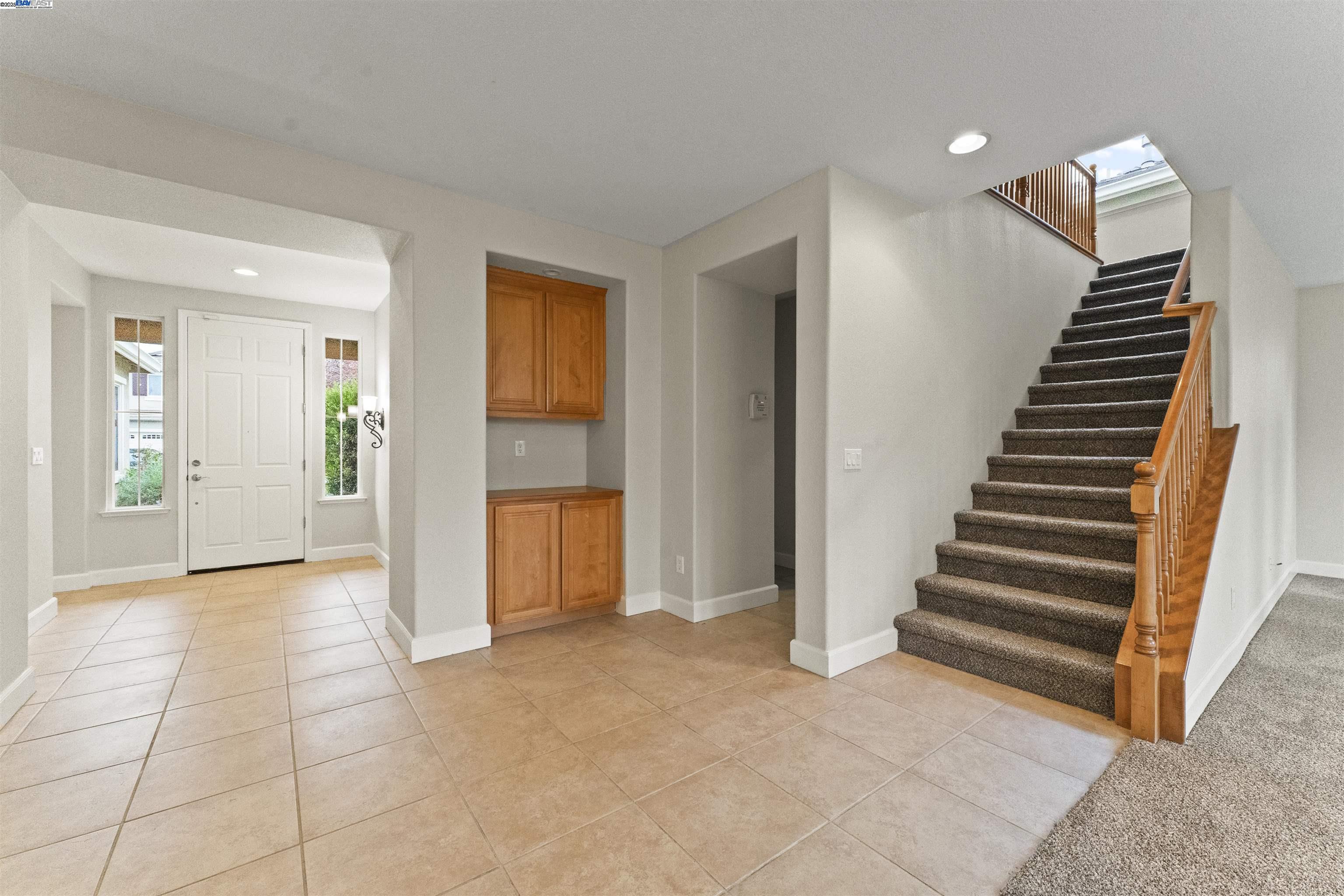 204 Daylilly Lane Patterson, CA 95363 - Photo 10 of 52 wooden floor in an empty room with wooden floor
