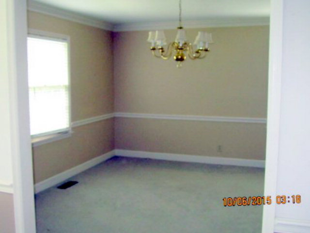 5165 Zebulon Road Macon, GA 31210 - Photo 11 of 28 a view of an empty room with a window