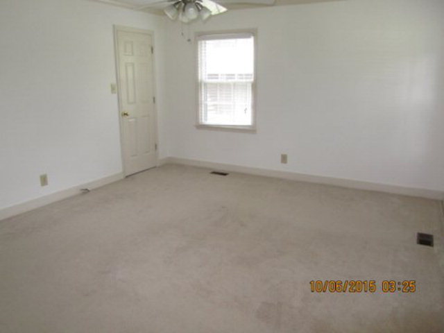 5165 Zebulon Road Macon, GA 31210 - Photo 13 of 28 an empty room with a window