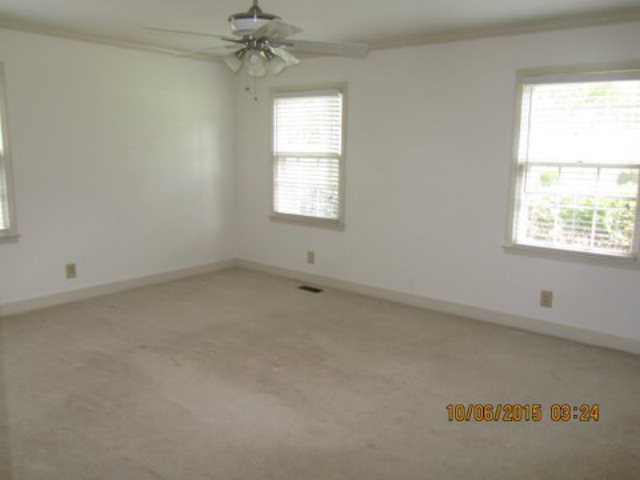 5165 Zebulon Road Macon, GA 31210 - Photo 14 of 28 an empty room with a window