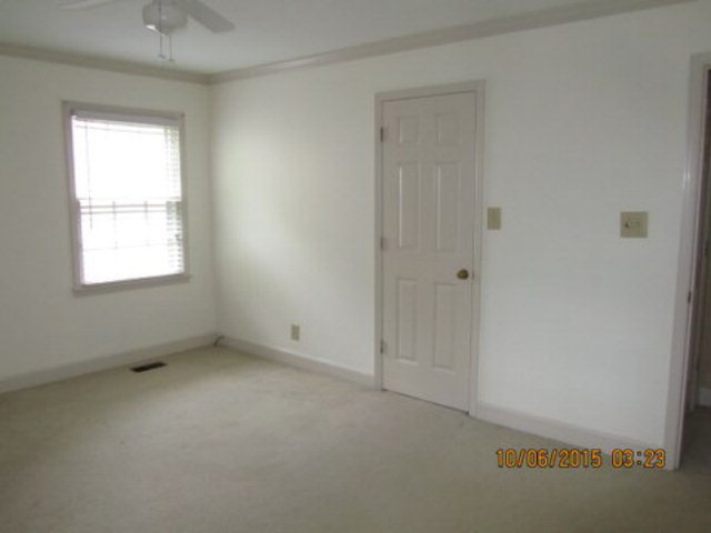 5165 Zebulon Road Macon, GA 31210 - Photo 18 of 28 an empty room with a window