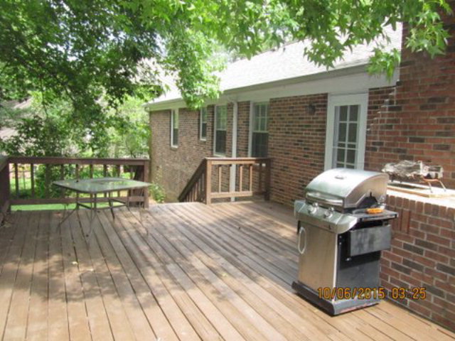 5165 Zebulon Road Macon, GA 31210 - Photo 20 of 28 a view of backyard with a deck
