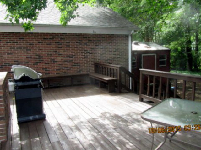 5165 Zebulon Road Macon, GA 31210 - Photo 21 of 28 a backyard of a house with seating space