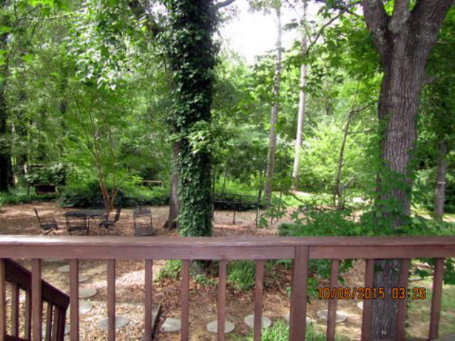 5165 Zebulon Road Macon, GA 31210 - Photo 22 of 28 a view of a yard with a tree