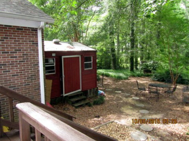 5165 Zebulon Road Macon, GA 31210 - Photo 23 of 28 a view of a backyard with a barn