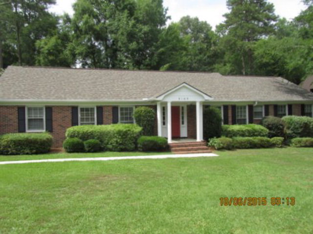 5165 Zebulon Road Macon, GA 31210 - Photo 28 of 28 a front view of a house with a yard and green space