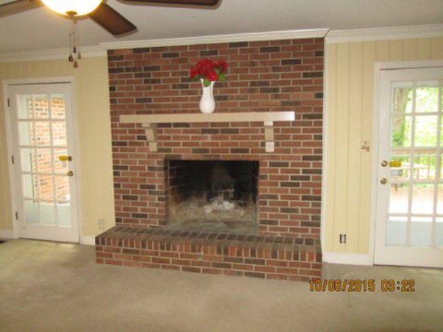 5165 Zebulon Road Macon, GA 31210 - Photo 4 of 28 a living room with a fireplace