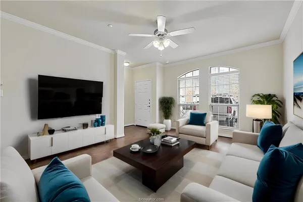 a kitchen with stainless steel appliances granite countertop a refrigerator a sink and a stove