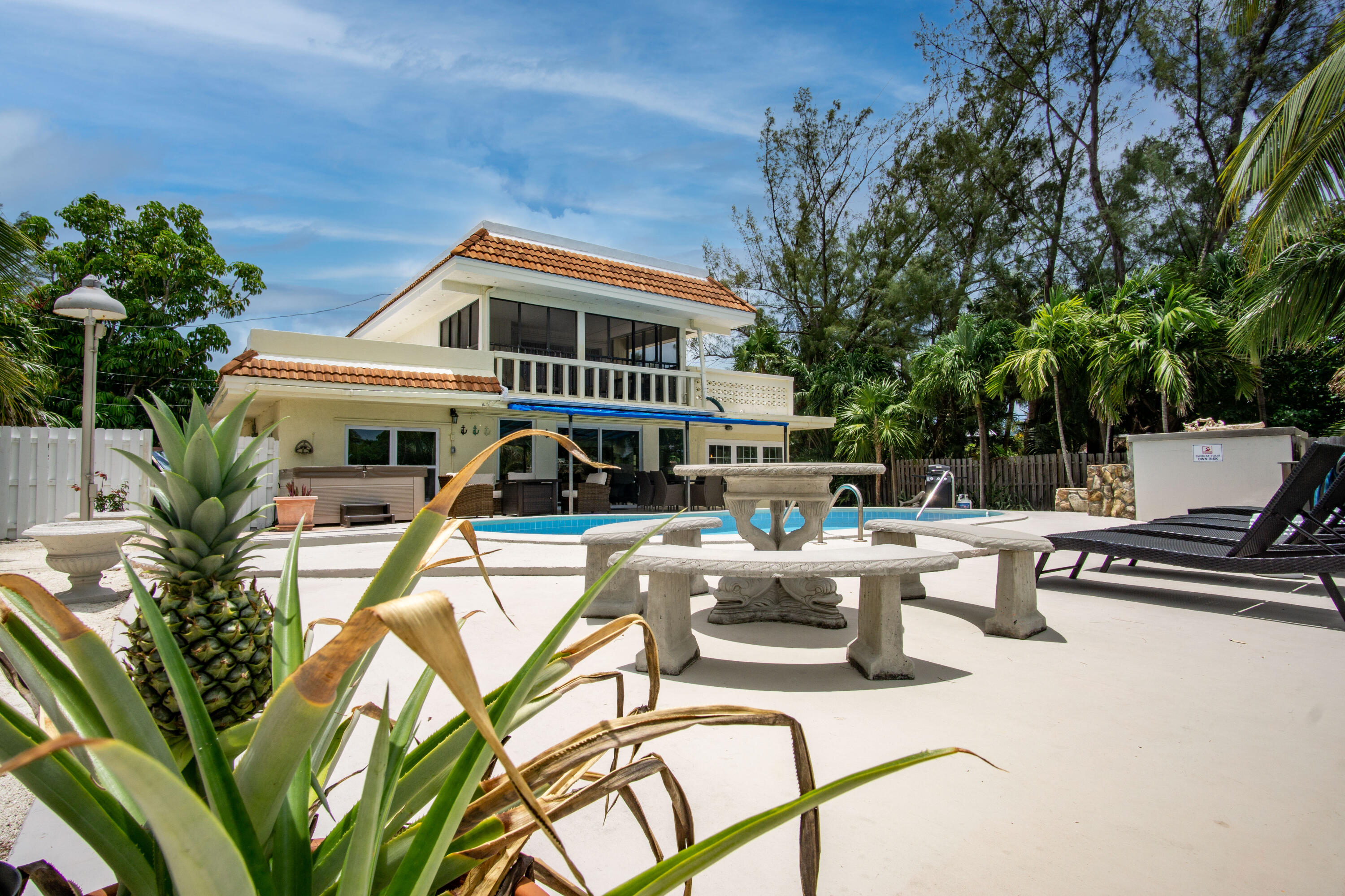 901 46th Street Marathon, FL 33050 - Photo 1 of 79 a view of a house with pool and sitting area