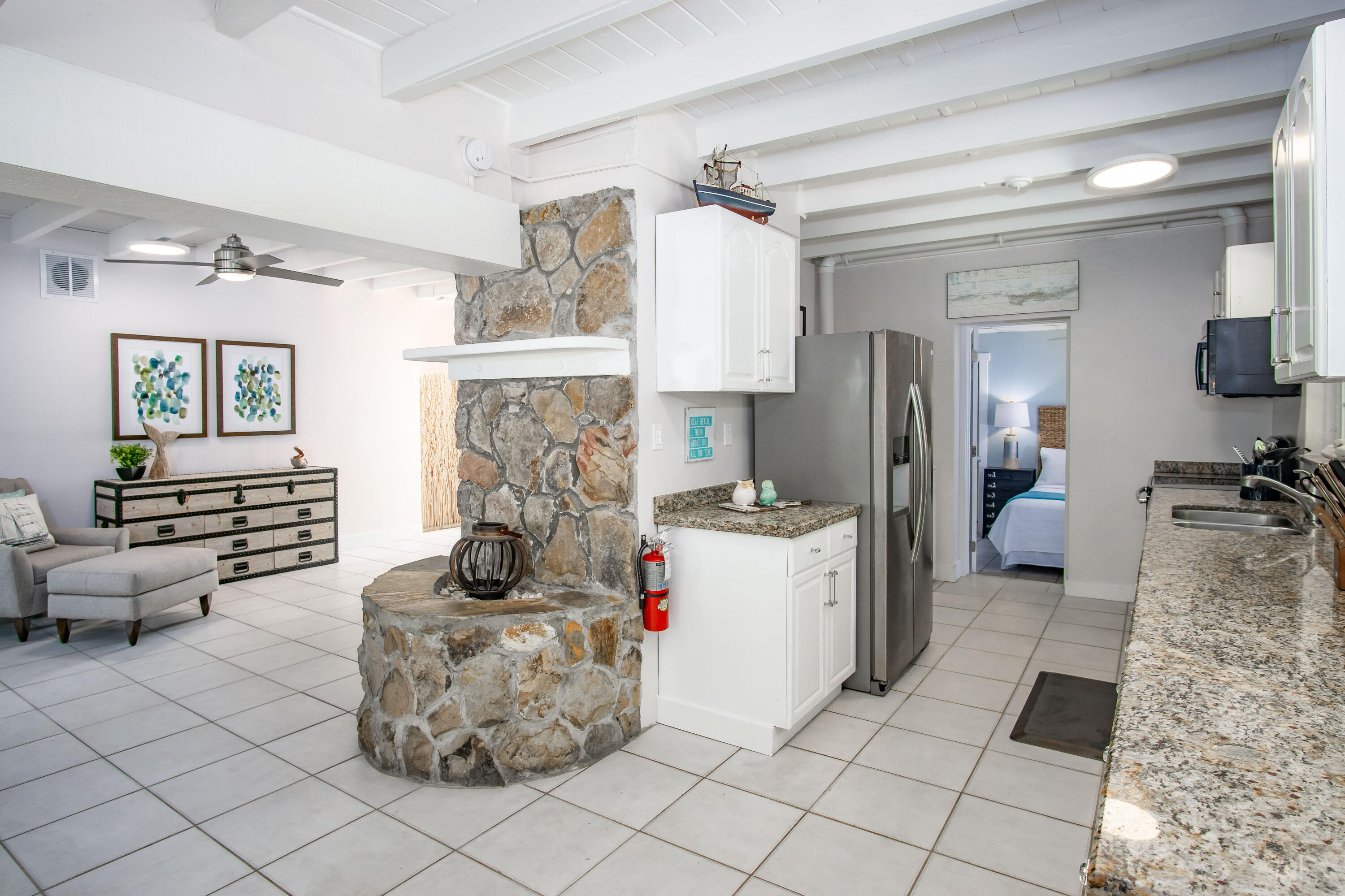 901 46th Street Marathon, FL 33050 - Photo 13 of 79 a living room with furniture and a fireplace