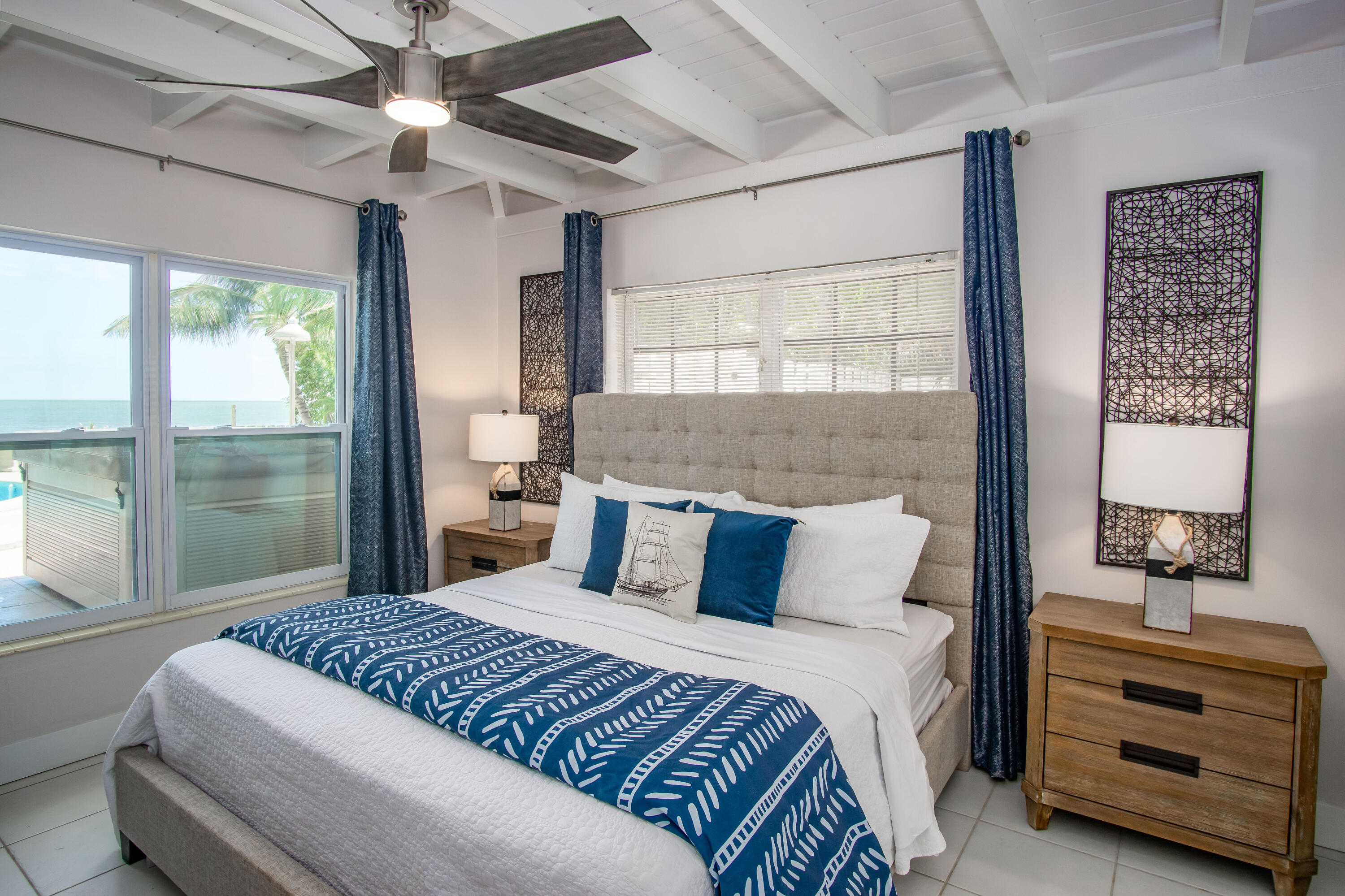 901 46th Street Marathon, FL 33050 - Photo 33 of 79 a bedroom with a large bed and a window