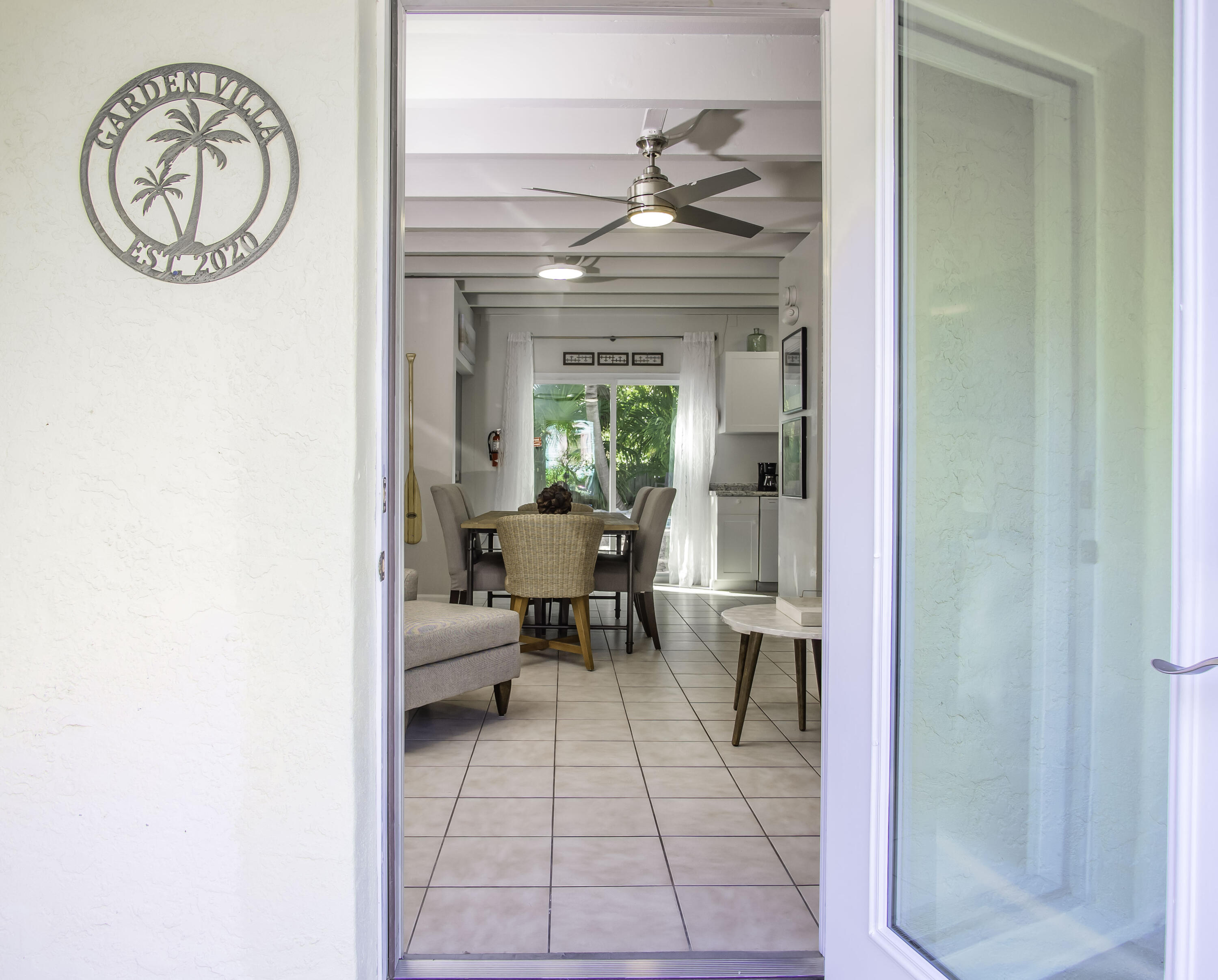 901 46th Street Marathon, FL 33050 - Photo 61 of 79 a view of a room with a dining table and chairs