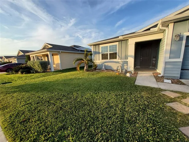 a house view with a garden space