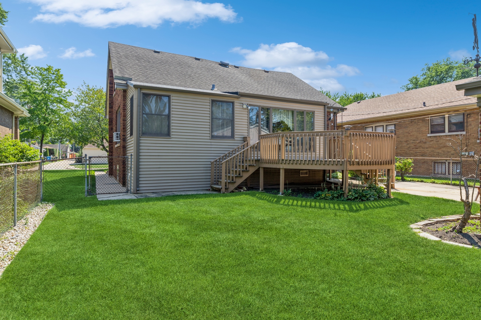 16 Albion Avenue Park Ridge, IL 60068 - Photo 8 of 10 a view of backyard with table and chairs and potted plants