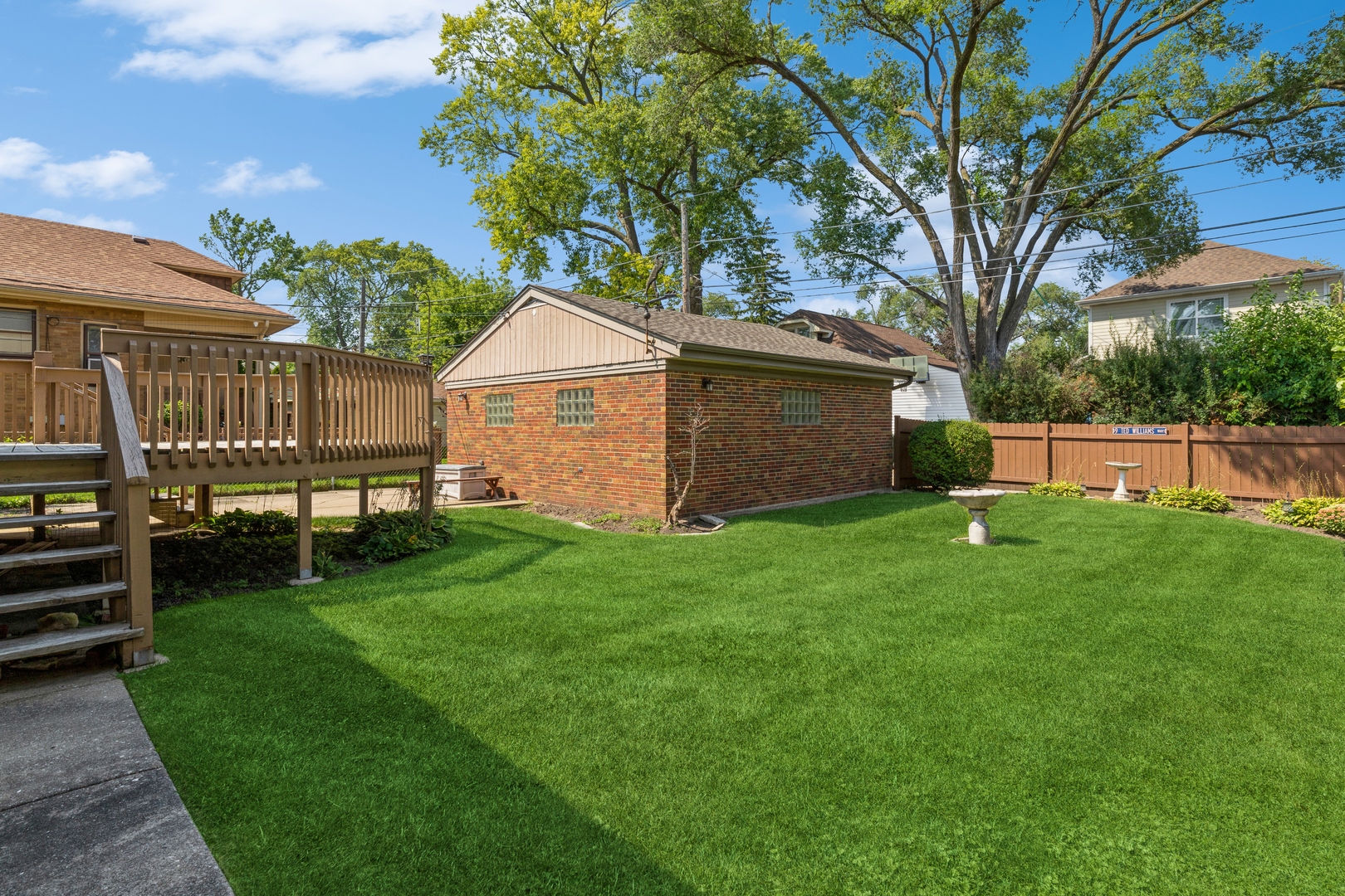 16 Albion Avenue Park Ridge, IL 60068 - Photo 9 of 10 a view of a backyard with a garden and entertaining space