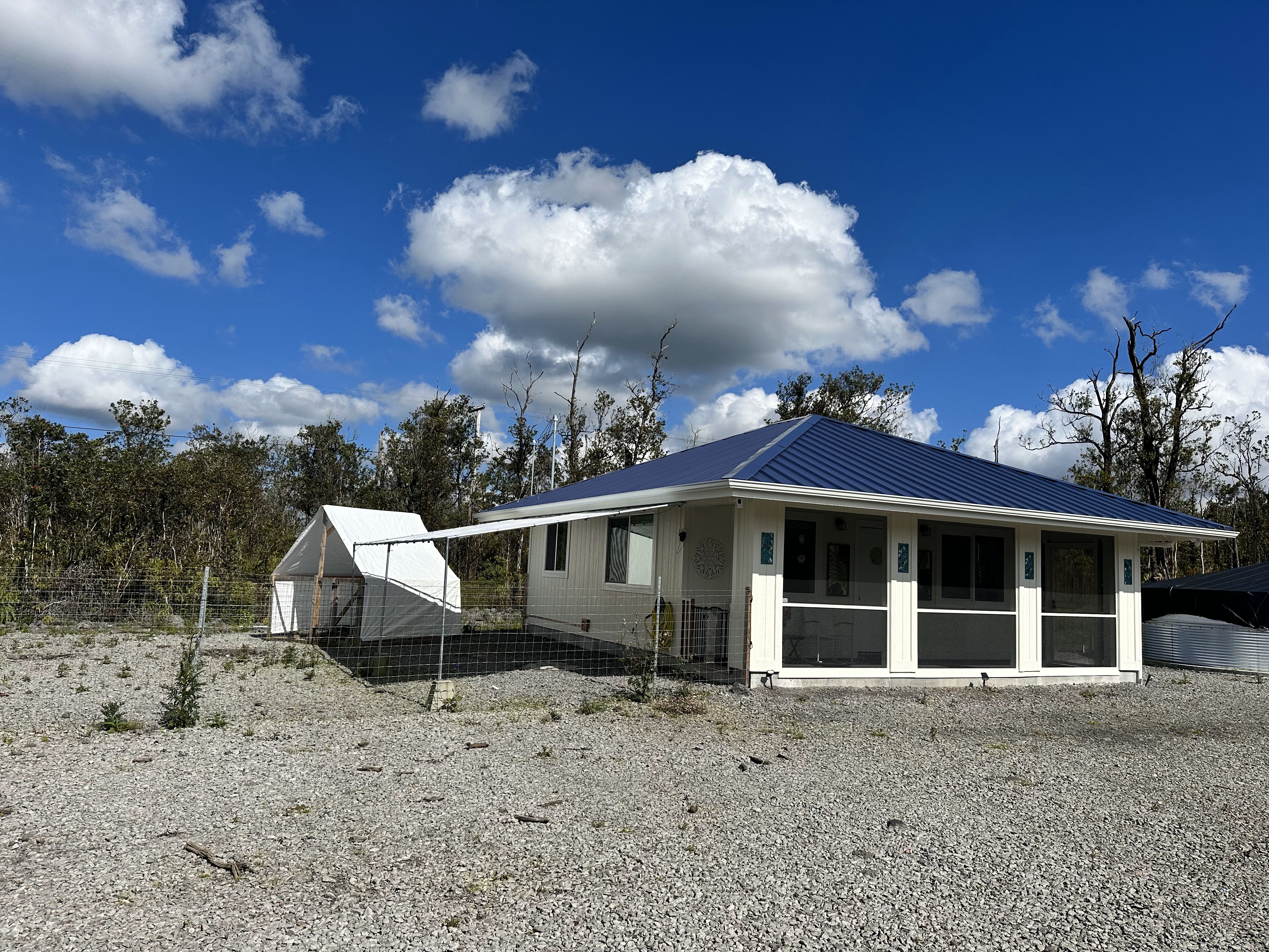 1 Kokokahi Road Mountain View, HI 96771 - Photo 1 of 27 a view of a house with a yard