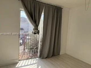 an empty room with a window