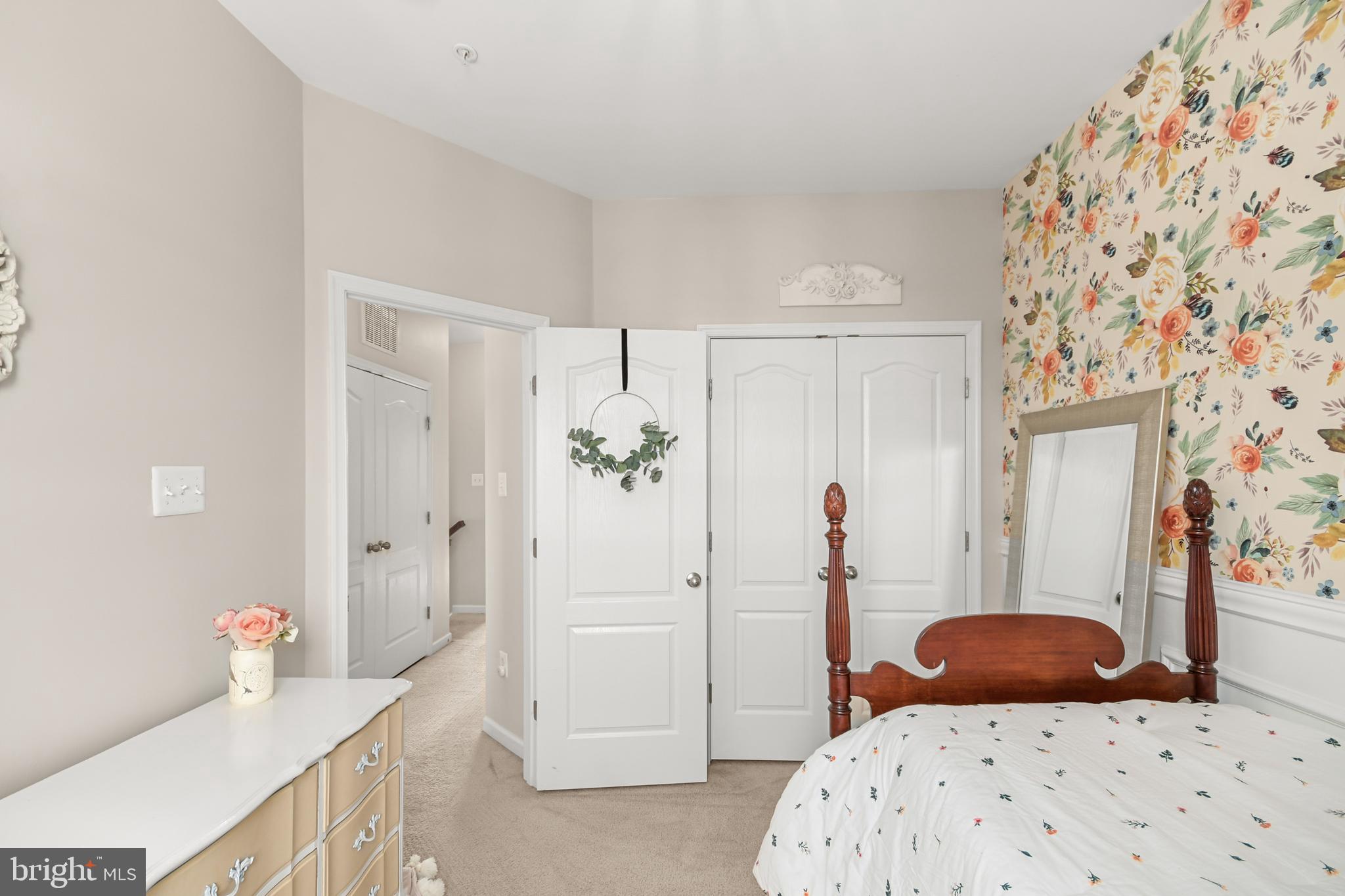 2709 Osprey Way North Frederick, MD 21701 - Photo 52 of 64 a bedroom with a bed and a dresser