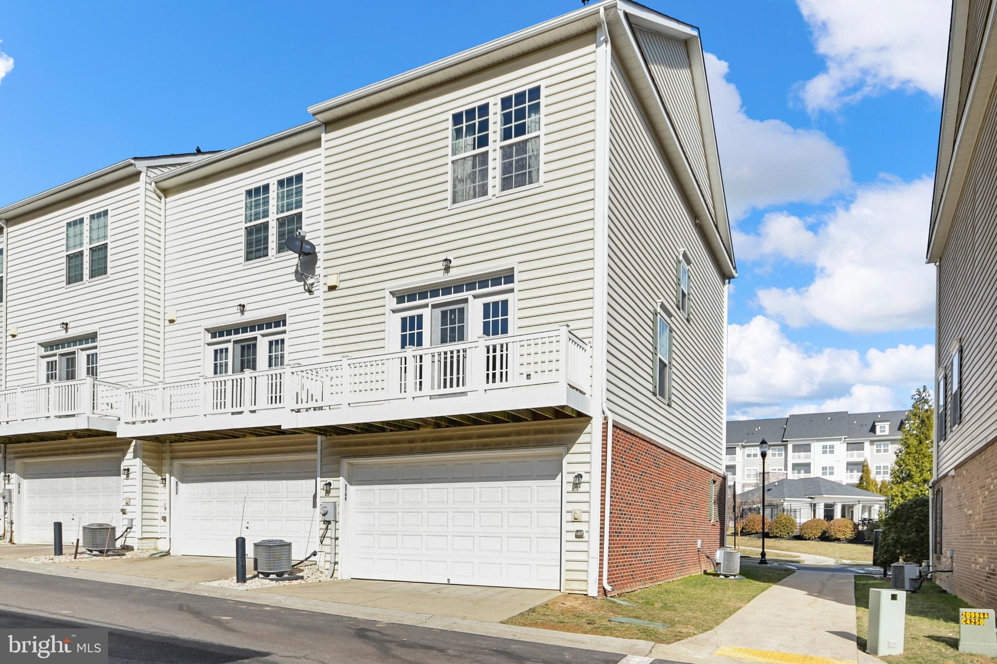 2709 Osprey Way North Frederick, MD 21701 - Photo 60 of 64 a front view of a house with a garage