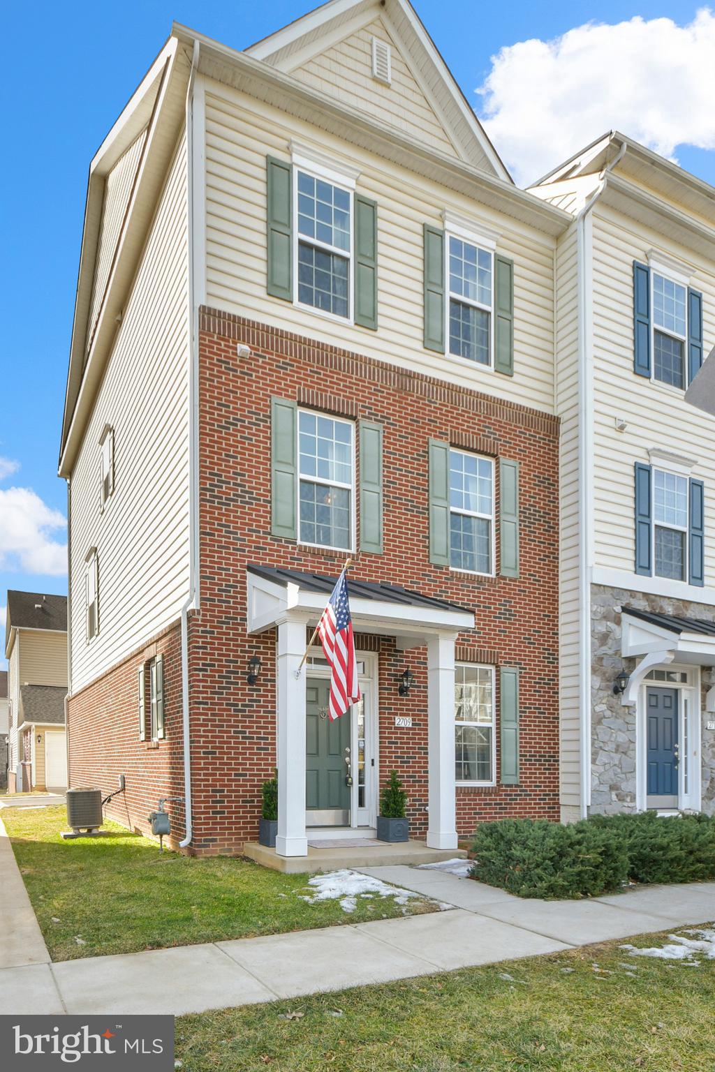 2709 Osprey Way North Frederick, MD 21701 - Photo 9 of 64 a front view of a house with a yard
