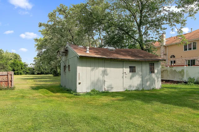 a view of a backyard with a garden
