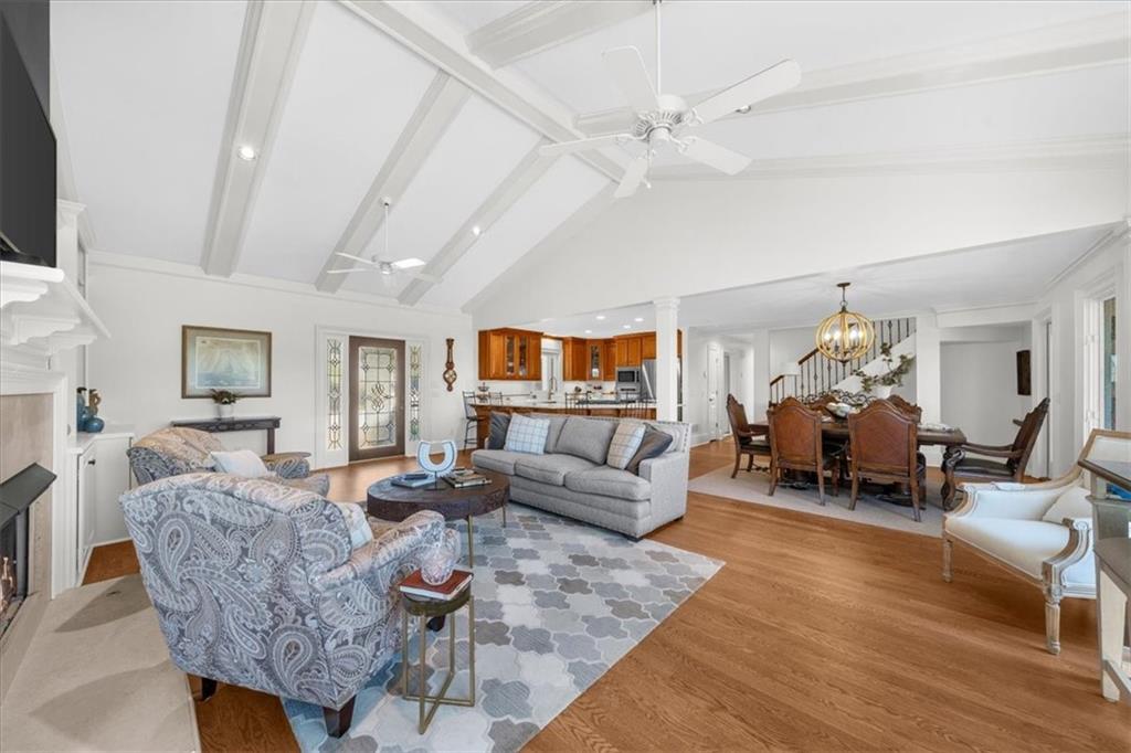 9230 Four Mile Creek Road Gainesville, GA 30506 - Photo 12 of 67 a living room with furniture and a fireplace