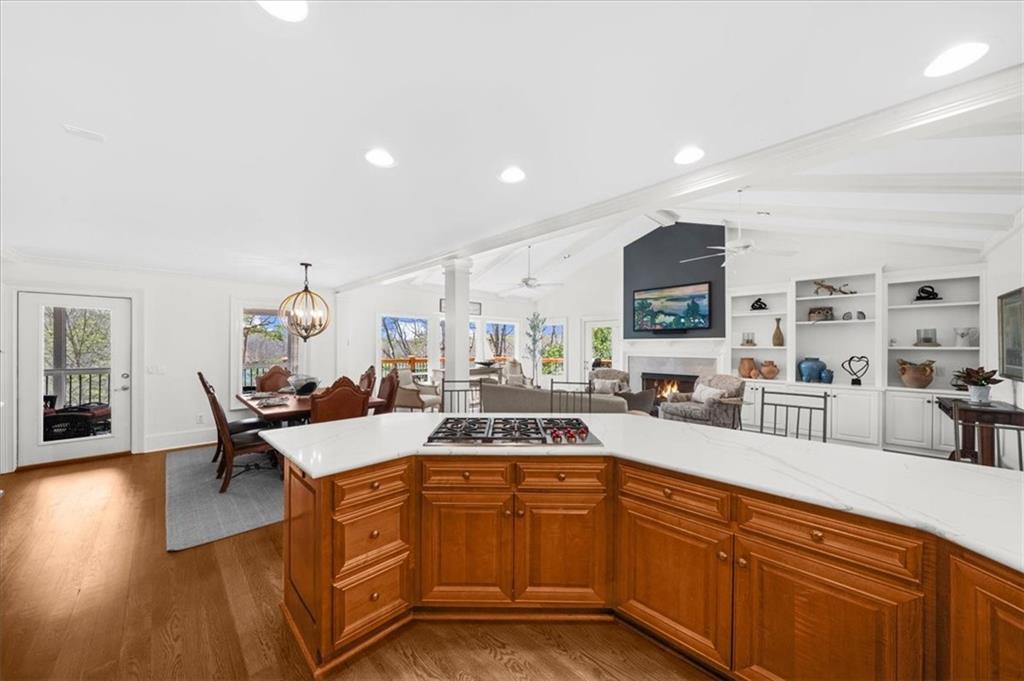 9230 Four Mile Creek Road Gainesville, GA 30506 - Photo 17 of 67 a large kitchen with a table and chairs