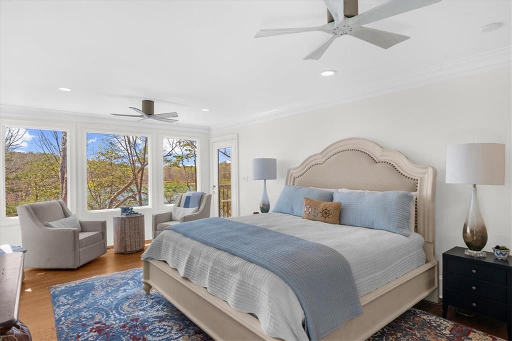 9230 Four Mile Creek Road Gainesville, GA 30506 - Photo 19 of 67 a bedroom with a large bed and a large window