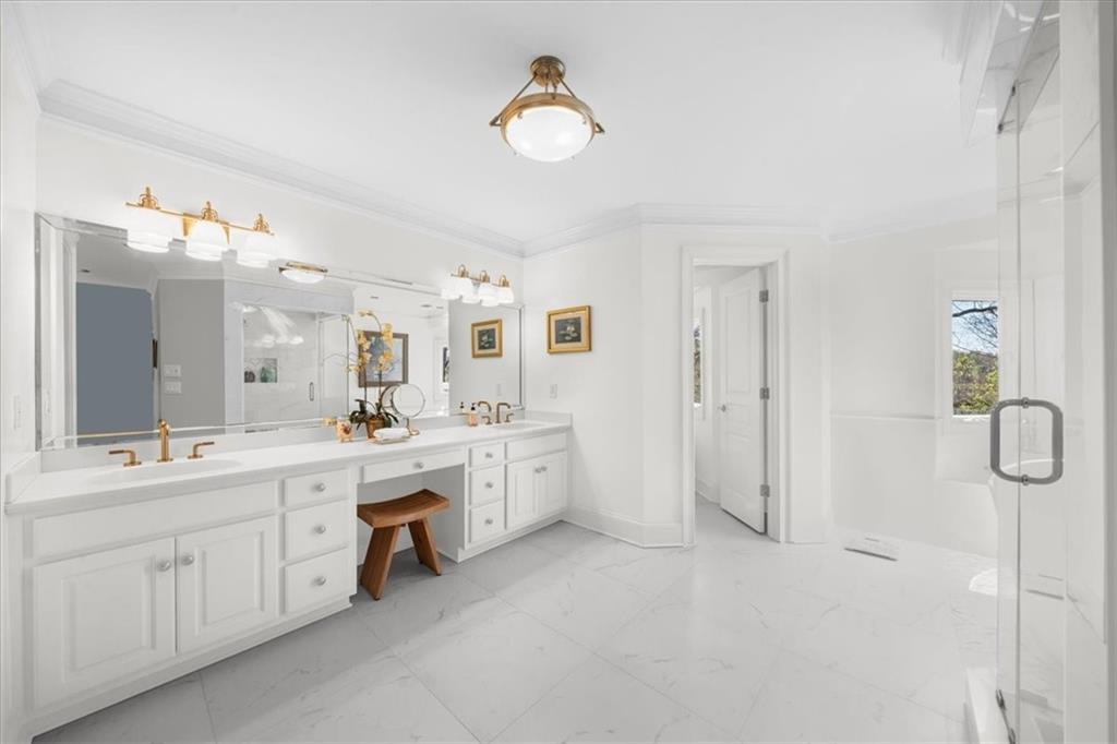 9230 Four Mile Creek Road Gainesville, GA 30506 - Photo 36 of 67 a spacious bathroom with a double vanity sink mirror and bathtub