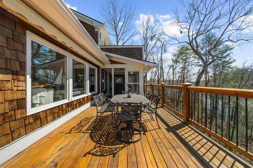 9230 Four Mile Creek Road Gainesville, GA 30506 - Photo 6 of 67 a view of balcony with wooden floor and outdoor seating