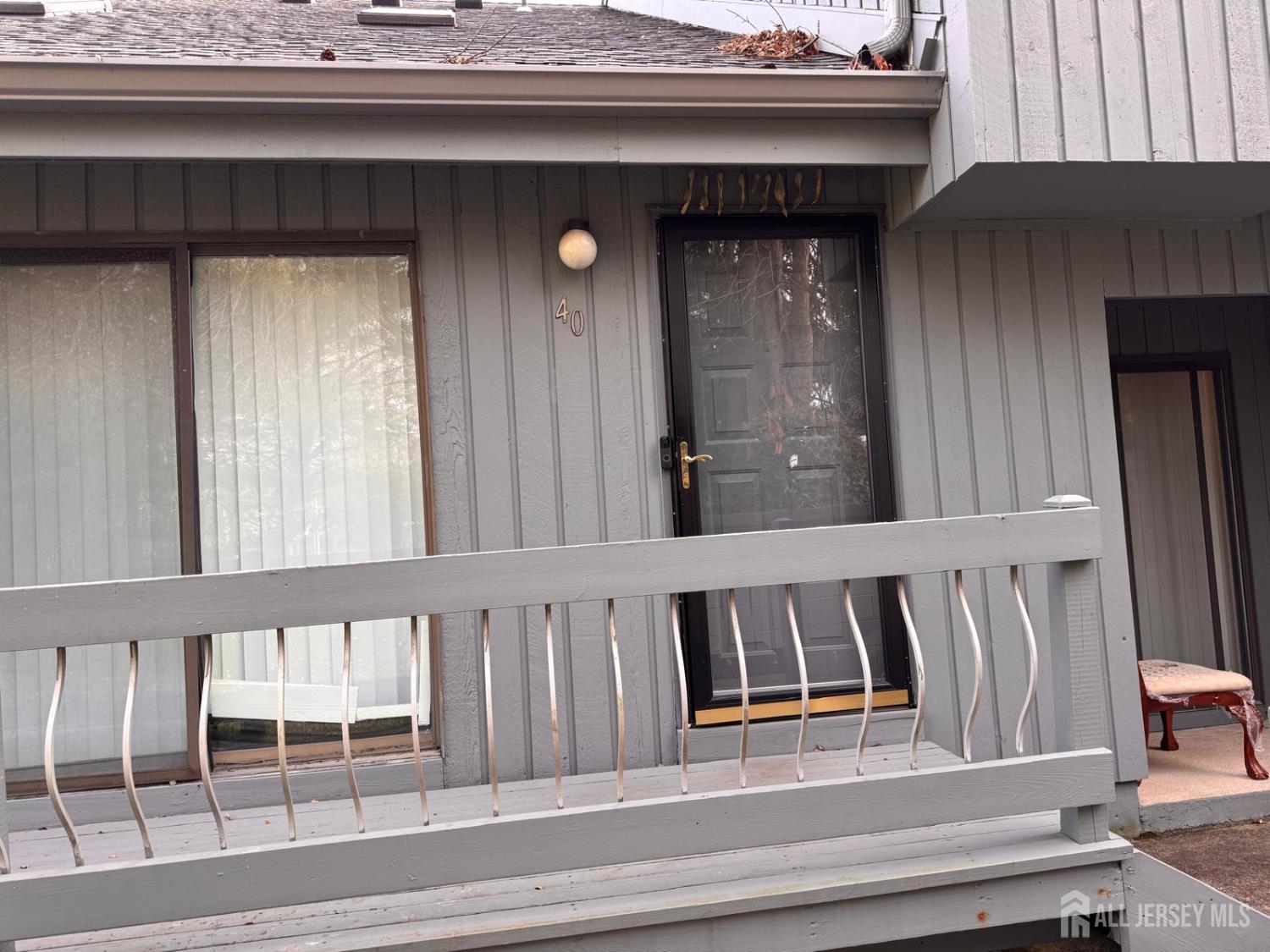 a view of wooden floor and a window
