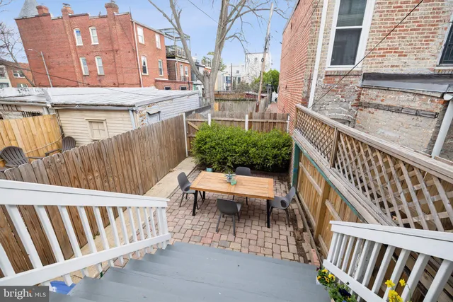 a view of balcony with furniture