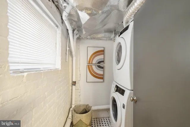 a bathroom with a sink a toilet and a shower