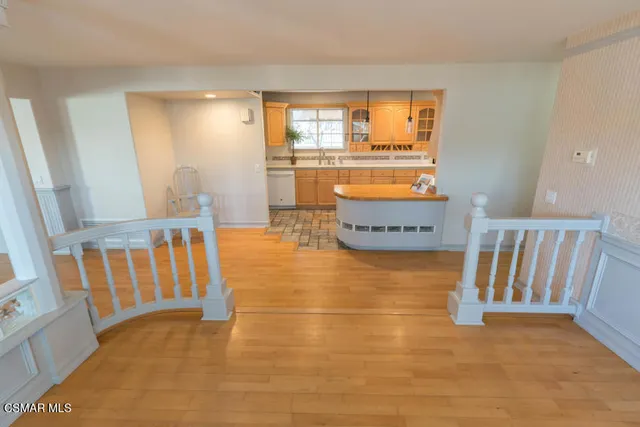 a view of kitchen with furniture and window