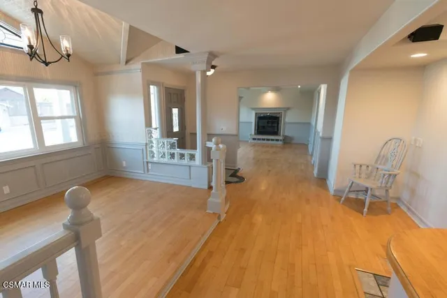 a view of a livingroom with furniture and windows