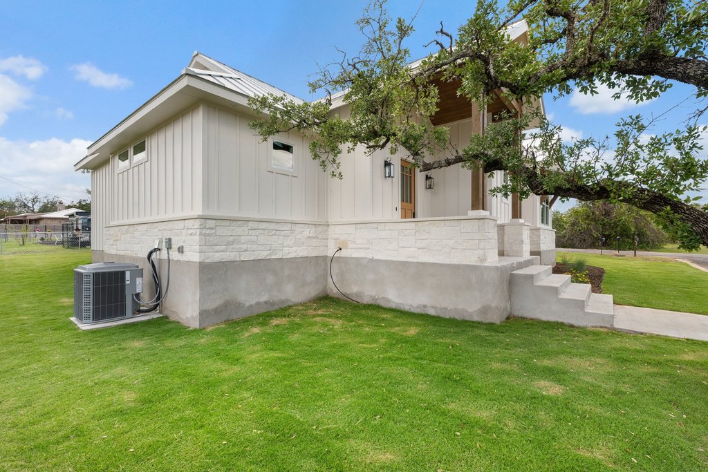501 Ranchview Drive Johnson City, TX 78636 - Photo 8 of 28 a view of a house with a yard and sitting area