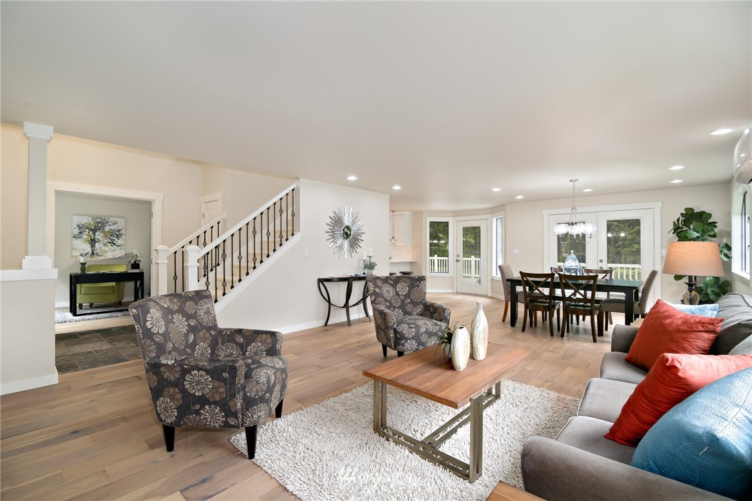 28505 Northeast Tolt Hill Road Carnation, WA 98014 - Photo 11 of 25 a living room with furniture and wooden floor