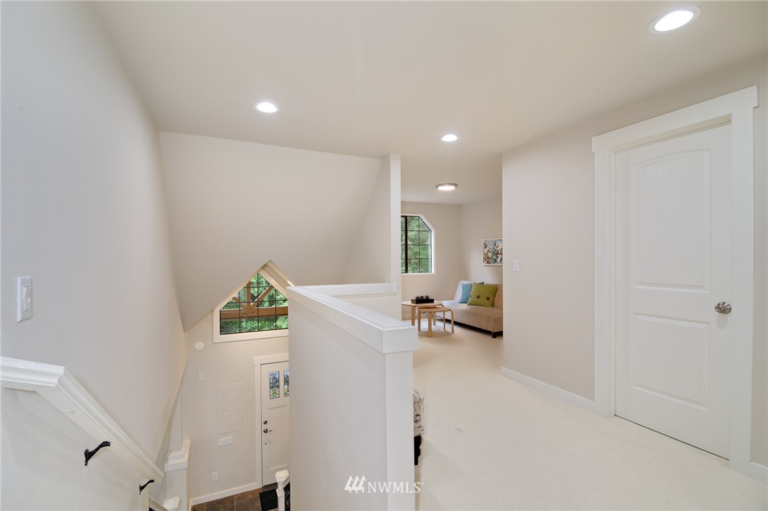 28505 Northeast Tolt Hill Road Carnation, WA 98014 - Photo 16 of 25 a view of a room with workspace and mirror in closet